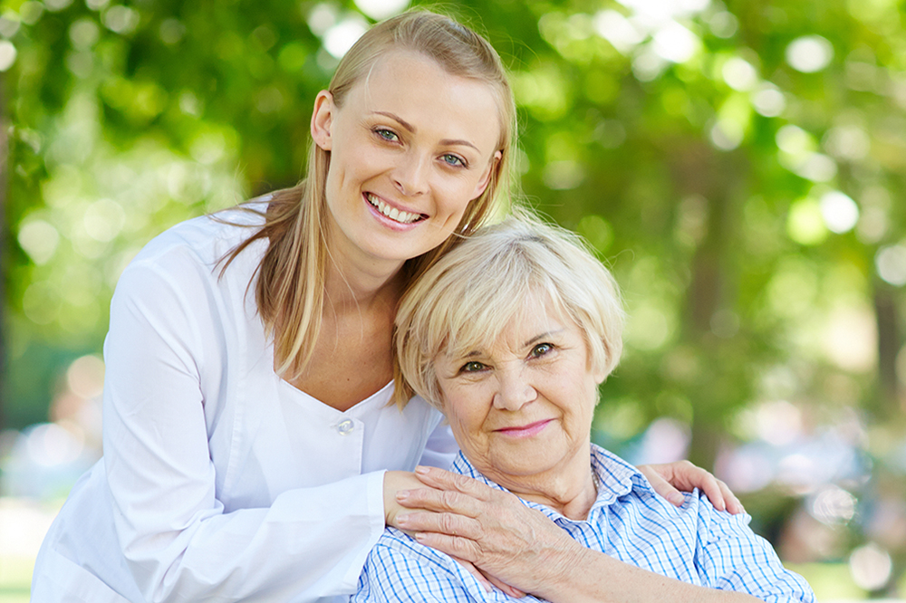 An Elderly Woman With a Young Woman